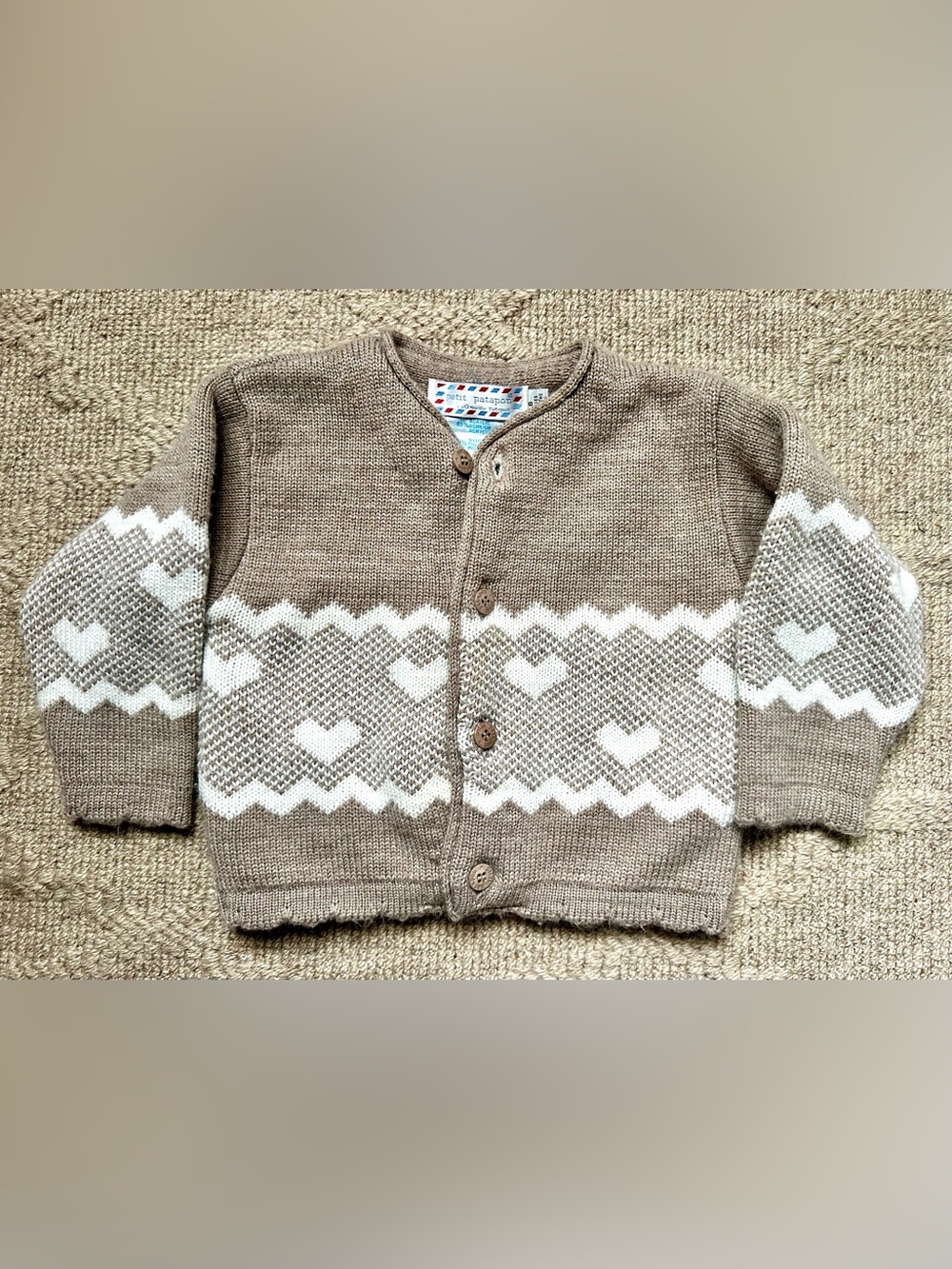Baby’s Tan Cardigan with White Heart Pattern
